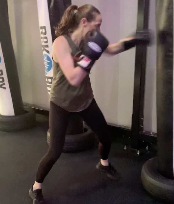 Dr. Molly McDonald staying active with a punching bag